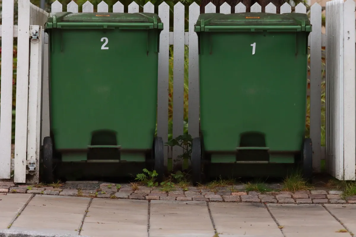 The same two bins after a hot-water clean and sanitize, spotless